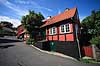 Gudhjem. Bindingsv�rkshus i Gudhjem p� Bornholm - Figenhuset  Gudhjem / Bornholm Danmark   Huse, bindingsv�rk, tegltag, landsbyidyl, idyl, ferie, feriesteder