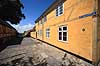 Roskilde. Bindingsv�rkshuse p� Lille Maglekildestr�de i Roskilde  Roskilde Danmark   gul, gult, gadeskilt