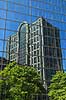 Boston. Skyskraber p� Clarendon Street spejler sig i glasvinduerne i anden skyskraber  Boston / Massachusetts USA  Sev�rdigheder Skyskrabere, storbyer, kontorbygninger